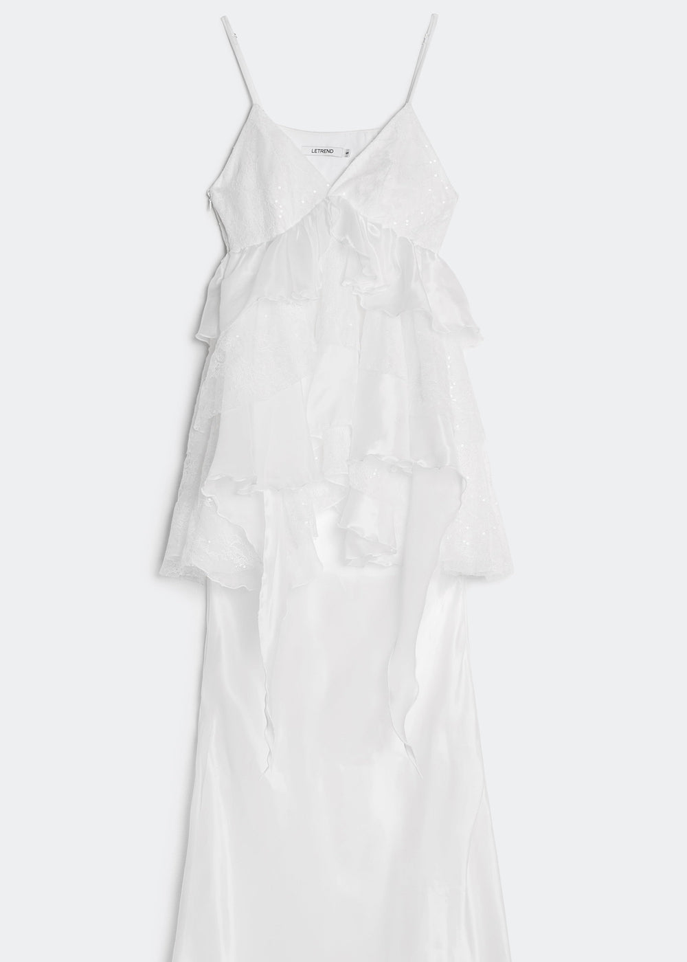 White dress with thin straps on a white background