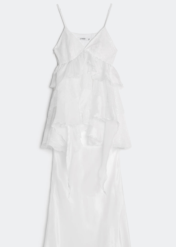 White dress with thin straps on a white background